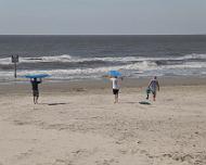 IMG_1650 Headed to the beach for instructions. James P is in white shirt, James T is in black shirt.