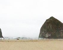Haystack Rock Haystack Rock. Notice the people walking on the beach